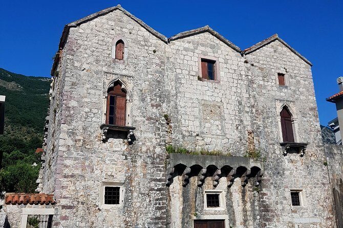Bike tour - Kotor Bay circle and visit Our Lady of the Rock - Ferry Kamenari: a 15-minute ride break that keeps the day fun