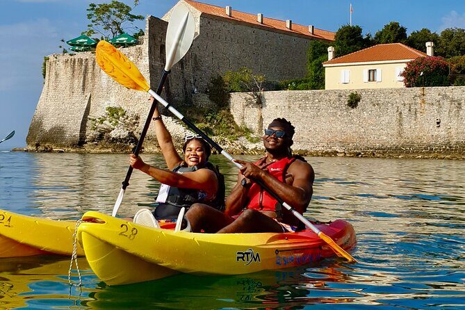 Budva Bay: Kayak & SUP Tour to Coastal Caves - Blue Lagune snorkeling: clear water, volcanic cliffs, and real swim time