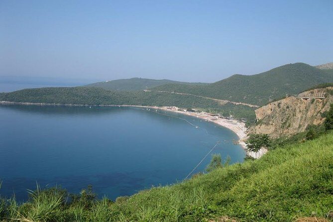 Kotor - Budva - Perast | Unforgettable Montenegro Experience - Jaz Beach hill stop (about 5 minutes): A quick reset with concert lore